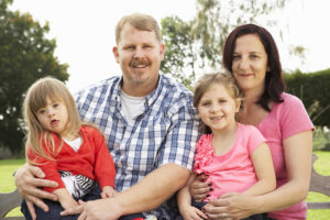 Happy Family with a disabled child